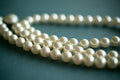 Pearl huggie hoops