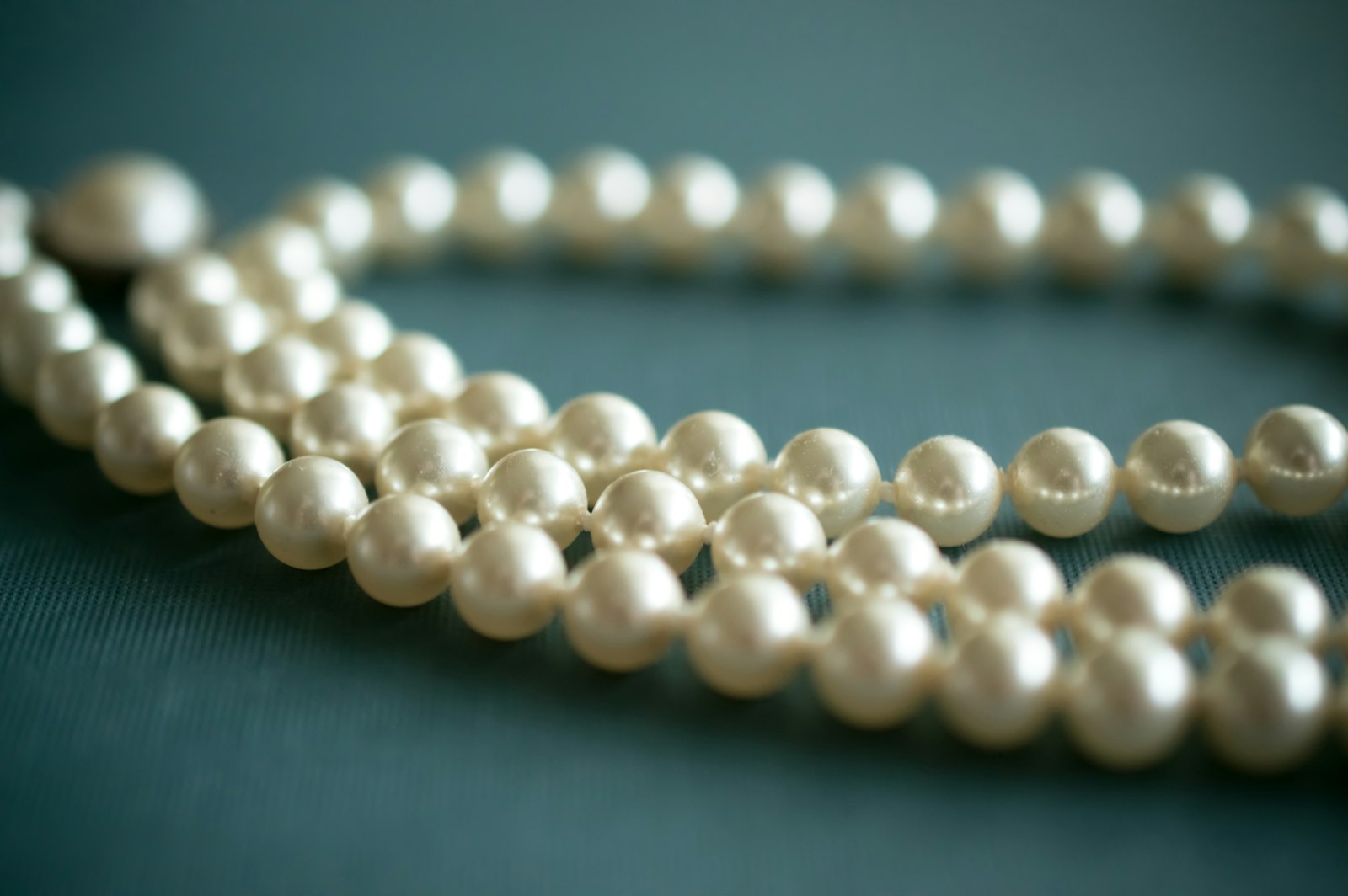 Pearl huggie hoops
